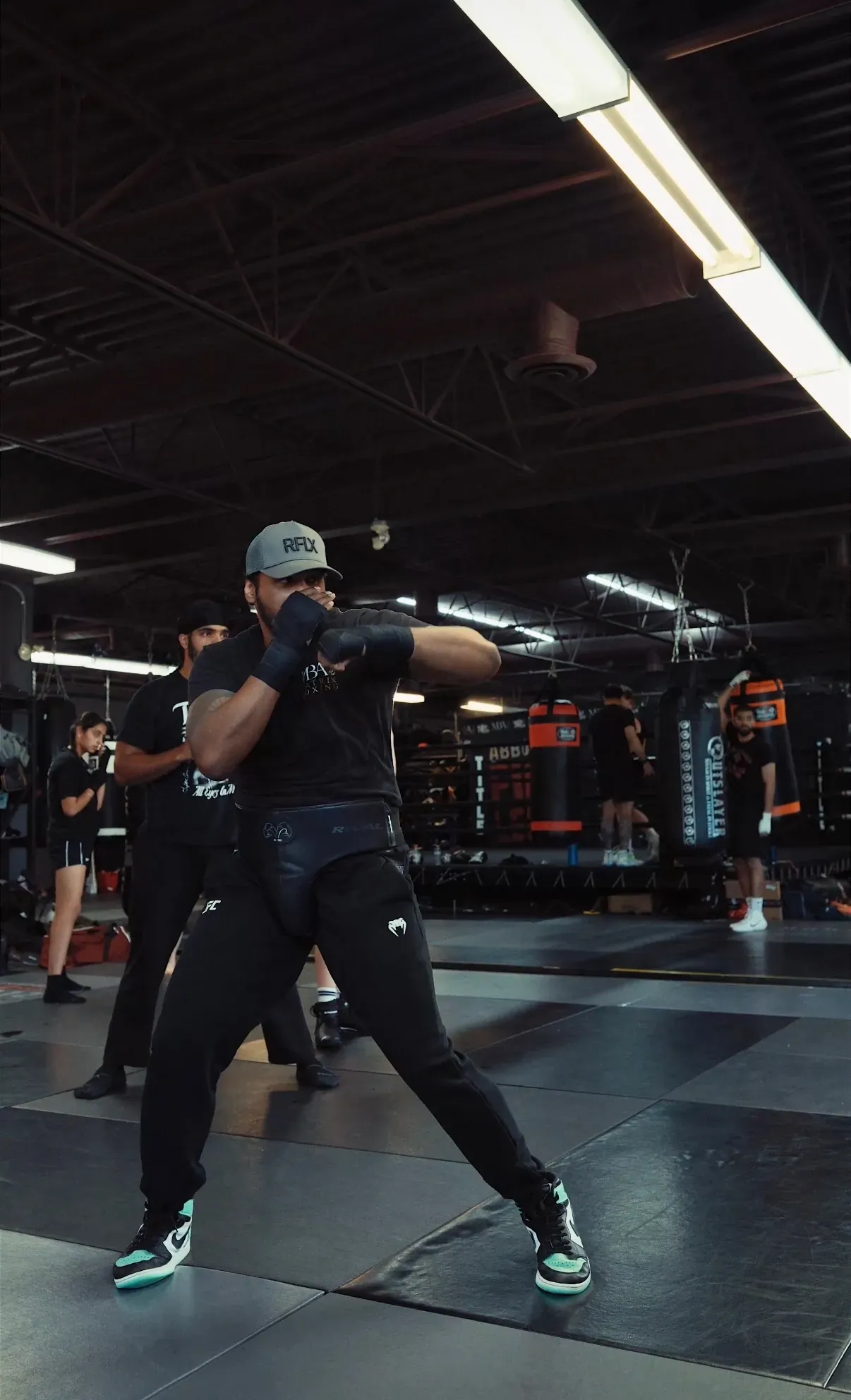 A class shadowboxing inside the Matrix Boxing Abbotsford gym
